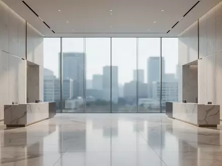 Ein minimalistisches, modernes Foyer einer Bank mit polierten Marmorböden und hellem Tageslicht. - Foto: über boerse-global.de