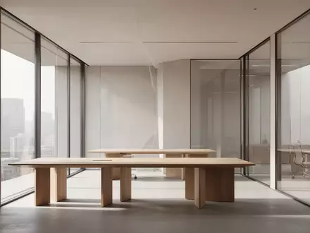 Ein minimalistisch gestalteter, leerer Büroraum mit klaren architektonischen Linien und hellem Tageslicht. - Foto: über boerse-global.de