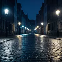 Eine nächtliche, verlassene Straße in einer deutschen Altstadt mit Kopfsteinpflaster und atmosphärischer Beleuchtung. - Foto: über boerse-global.de