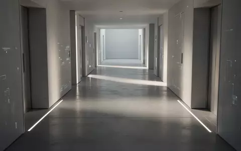 Ein minimalistischer, modern gestalteter Flur mit weichem Lichteinfall und klaren architektonischen Linien. - Foto: über boerse-global.de