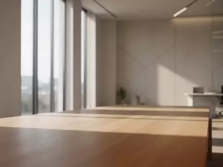 Ein minimalistischer, moderner Innenraum mit natürlichem Licht, das auf eine leere Holzoberfläche fällt. - Foto: über boerse-global.de