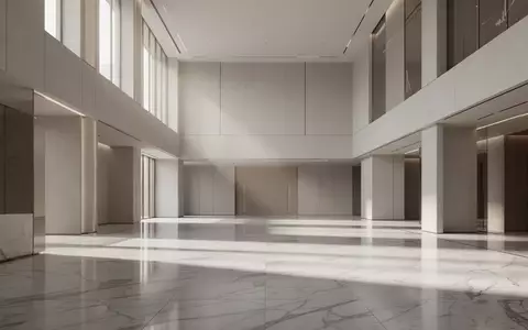 Ein minimalistisches, modernes Atrium eines Finanzinstituts mit polierten Böden und klaren architektonischen Linien. - Foto: über boerse-global.de