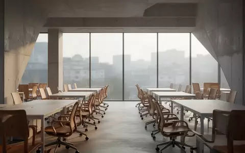 Ein minimalistisches, modernes Büro mit leeren, ergonomischen Stühlen und klaren Linien bei Tageslicht. - Foto: über boerse-global.de