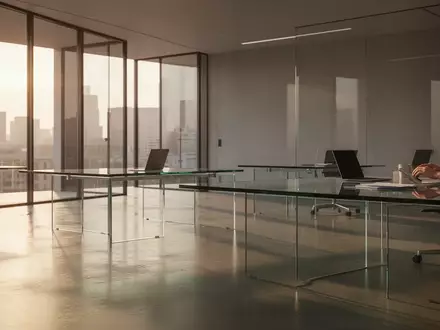 Ein minimalistisch gestalteter, moderner Büroraum mit klaren Linien und natürlichem Lichteinfall. - Foto: über boerse-global.de