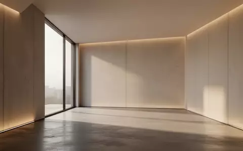 Ein minimalistischer, moderner Innenraum mit klaren architektonischen Linien und natürlichem Licht. - Foto: über boerse-global.de