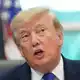 Sloweniens Internet-Domainverwaltung  - register.si - wird mit Anträgen überlaufen, seitdem US-Präsident Donald Trump KI in SI umtaufen will. - Bild: Alex Brandon/AP/dpa