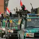 Im Irak wird der US-Truppenabzug als «Tag der Unabhängigkeit» gefeiert. - Bild: Hadi Mizban/AP/dpa