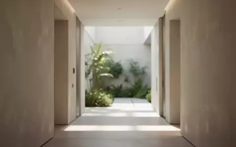 Ein helles, modern gestaltetes architektonisches Interieur mit weichem Lichteinfall und einer ruhigen, beruhigenden Atmosphäre. - Foto: über boerse-global.de