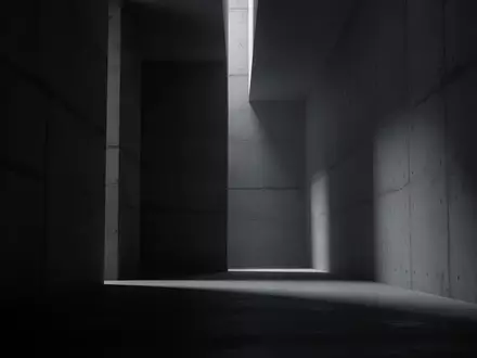 Abstrakte architektonische Innenansicht mit tiefen Schatten und minimalistischen Linien, die eine kühle, industrielle Atmosphäre erzeugt. - Foto: über boerse-global.de