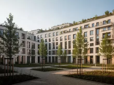 Ein modernes Wohngebäude mit begrünter Dachfläche und einer gepflegten Außenanlage in einem Berliner Stadtquartier. - Foto: über boerse-global.de