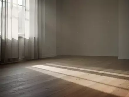 Ein minimalistischer, lichtdurchfluteter Raum mit sanften Schatten auf einem Holzboden, der Ruhe und Gelassenheit ausstrahlt. - Foto: über boerse-global.de