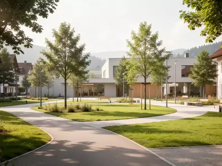 Ein sonniger, moderner Park in einer bayerischen Kleinstadt mit gepflegten Wegen und Grünflächen zur Gesundheitsförderung. - Foto: über boerse-global.de