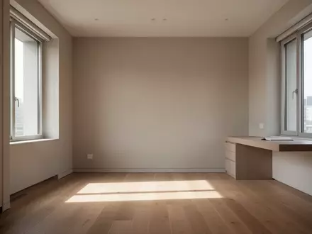 Ein lichtdurchflutetes, minimalistisches Arbeitszimmer mit Holzboden und neutralen Wänden ohne Möbel. - Foto: über boerse-global.de