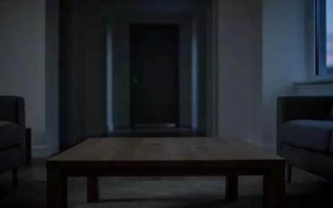 Ein minimalistisch eingerichtetes, leeres Wohnzimmer in gedimmtem Licht, das eine Atmosphäre der Isolation vermittelt. - Foto: über boerse-global.de