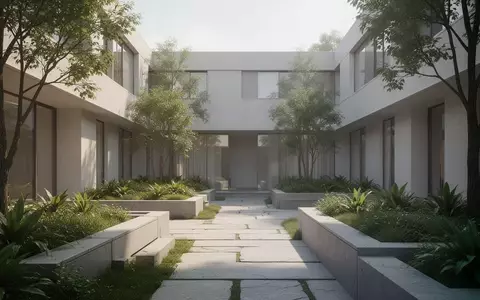 Ein minimalistischer Innenhof einer modernen medizinischen Einrichtung mit klaren architektonischen Linien und Begrünung. - Foto: über boerse-global.de