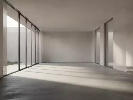 Ein minimalistischer, moderner Innenraum mit weichem Tageslicht und klaren architektonischen Linien ohne Personen. - Foto: über boerse-global.de