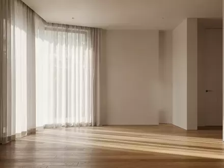 Ein minimalistisch gestalteter, lichtdurchfluteter Raum mit warmem Lichteinfall und einer ruhigen, professionellen Atmosphäre. - Foto: über boerse-global.de