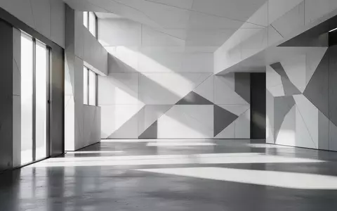 Ein minimalistischer, moderner Innenraum mit klaren geometrischen Linien und natürlichem Lichteinfall. - Foto: über boerse-global.de