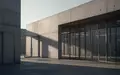 Moderne, minimalistische Architektur eines Forschungsgebäudes mit klaren Linien und Schattenwurf bei spätem Sonnenlicht. - Foto: über boerse-global.de