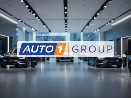 Modernes Autohaus mit atmosphärischer Beleuchtung als Symbol für den Automobilsektor und Marktbewegungen. - Foto: über boerse-global.de