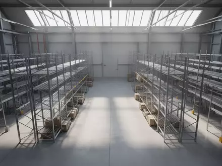 Ein aufgeräumtes Industrielager mit Metallregalen und Betonboden bei natürlichem Lichteinfall. - Foto: über boerse-global.de
