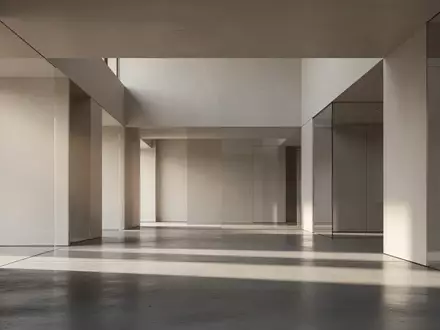 Ein minimalistischer, moderner Innenraum mit klaren Linien, architektonischen Strukturen und natürlichem Lichteinfall. - Foto: über boerse-global.de