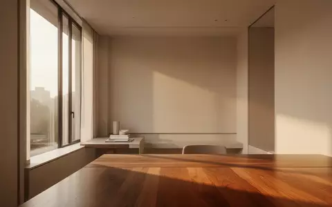 Ein minimalistischer, lichtdurchfluteter Arbeitsbereich mit klaren architektonischen Linien und natürlichem Lichteinfall. - Foto: über boerse-global.de