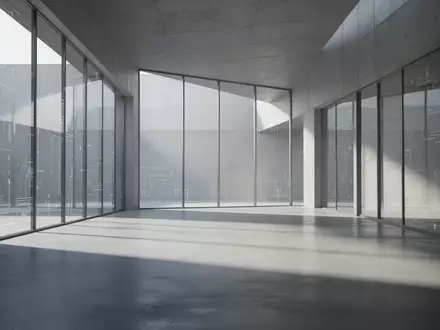 Ein minimalistischer, moderner Innenraum mit klaren architektonischen Linien und sanftem, natürlichem Lichteinfall. - Foto: über boerse-global.de