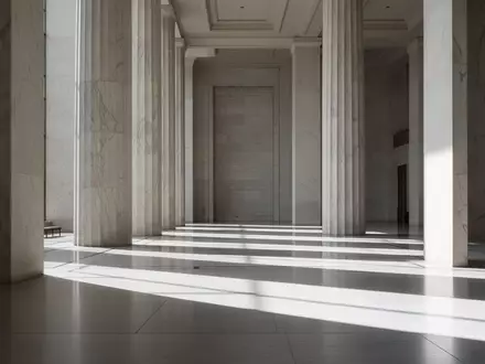 Innenansicht eines modernen Parlamentsgebäudes mit geometrischen Schatten und Marmorsäulen. - Foto: über boerse-global.de