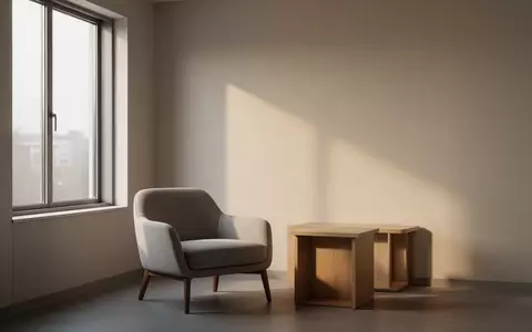 Ein minimalistischer, ruhiger Behandlungsraum mit Tageslicht und schlichtem Mobiliar. - Foto: über boerse-global.de