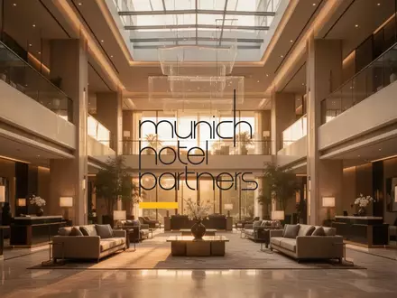 Abstrakte Darstellung einer luxuriösen Hotel-Lobby mit warmer, einladender Lichtstimmung. - Foto: über boerse-global.de