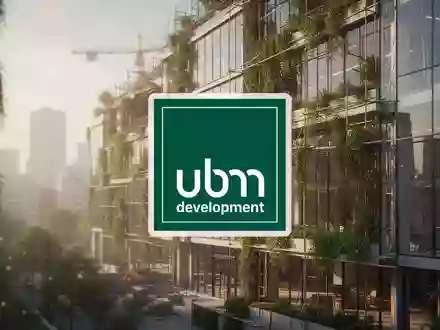 Moderne, nachhaltige Architektur mit vertikalen Gärten bei Sonnenaufgang als Symbol für grüne Immobilienfinanzierung. - Foto: über boerse-global.de