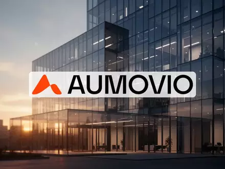 Abstrakte Darstellung einer modernen Büroarchitektur in der Abenddämmerung als Symbol für unternehmerischen Wandel. - Foto: über boerse-global.de