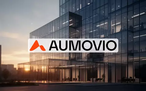 Abstrakte Darstellung einer modernen Büroarchitektur in der Abenddämmerung als Symbol für unternehmerischen Wandel. - Foto: über boerse-global.de