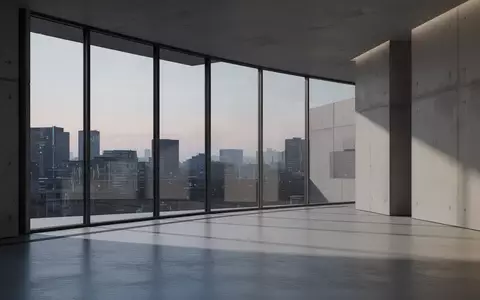 Minimalistische, moderne Architektur mit klaren Linien und weichem Licht in einem leeren Raum. - Foto: über boerse-global.de