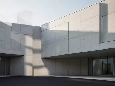 Modernes Krankenhausgebäude mit minimalistischer Architektur und klaren Fassadenlinien bei Tageslicht. - Foto: über boerse-global.de