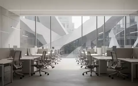 Ein minimalistisch gestalteter, unbesetzter Büroarbeitsplatz mit moderner Einrichtung und hellem Tageslicht. - Foto: über boerse-global.de