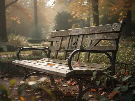 Ein einsamer Parkbank in einem herbstlichen Garten symbolisiert den demografischen Wandel und das Altern. - Foto: über boerse-global.de