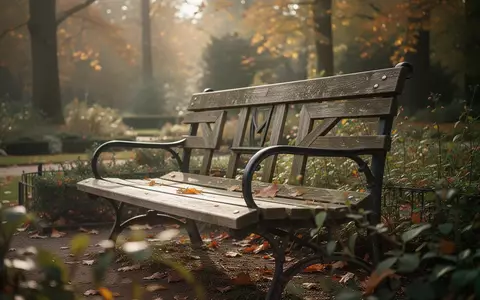 Ein einsamer Parkbank in einem herbstlichen Garten symbolisiert den demografischen Wandel und das Altern. - Foto: über boerse-global.de