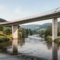 Eine moderne Betonbrücke über einen Fluss in einer grünen Landschaft in Baden-Württemberg. - Foto: über boerse-global.de
