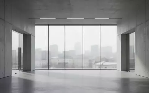Ein minimalistisches, modernes Interieur eines Finanzgebäudes mit großen Glasfronten und neutralem Lichteinfall. - Foto: über boerse-global.de
