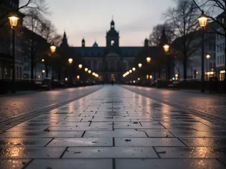 Ein beleuchteter, barrierefreier Fußgängerweg in einer deutschen Stadt bei Dämmerung, der zur sozialen Interaktion einlädt. - Foto: über boerse-global.de