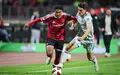 Nürnbergs Rayan Ghrieb (links) im Zweikampf mit Joakim Maehle aus Wolfsburg. - Foto: Daniel Karmann/dpa