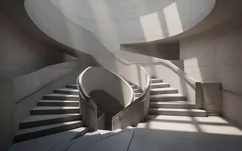 Abstrakte Architekturaufnahme einer verschlungenen Treppe mit geometrischen Schattenwürfen in einem modernen Gebäude. - Foto: über boerse-global.de
