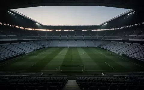 Ein leeres, professionelles Fußballstadion in der frühen Morgendämmerung bei natürlichem Licht. - Foto: über boerse-global.de