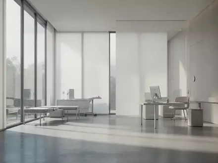 Ein minimalistischer, heller Architekturraum mit sanftem Tageslicht, der eine ruhige und klinische Atmosphäre vermittelt. - Foto: über boerse-global.de