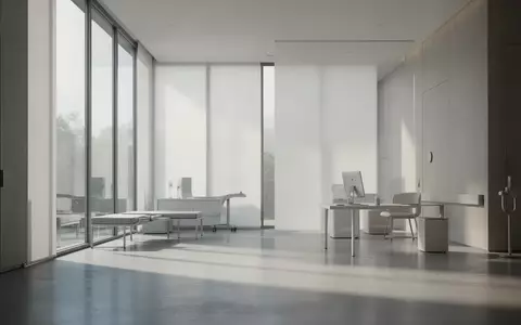 Ein minimalistischer, heller Architekturraum mit sanftem Tageslicht, der eine ruhige und klinische Atmosphäre vermittelt. - Foto: über boerse-global.de