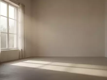 Ein minimalistischer, lichtdurchfluteter Raum mit sanften Schatten, der Ruhe und Reflexion symbolisiert. - Foto: über boerse-global.de