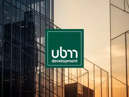 Architektonisches Detail eines modernen Bürogebäudes bei Sonnenuntergang als Symbol für Immobilienfinanzierung. - Foto: über boerse-global.de