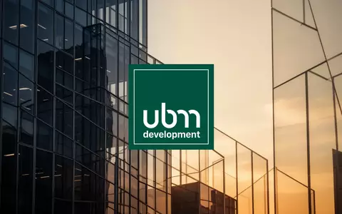 Architektonisches Detail eines modernen Bürogebäudes bei Sonnenuntergang als Symbol für Immobilienfinanzierung. - Foto: über boerse-global.de